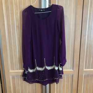 Purple long sleeved dress